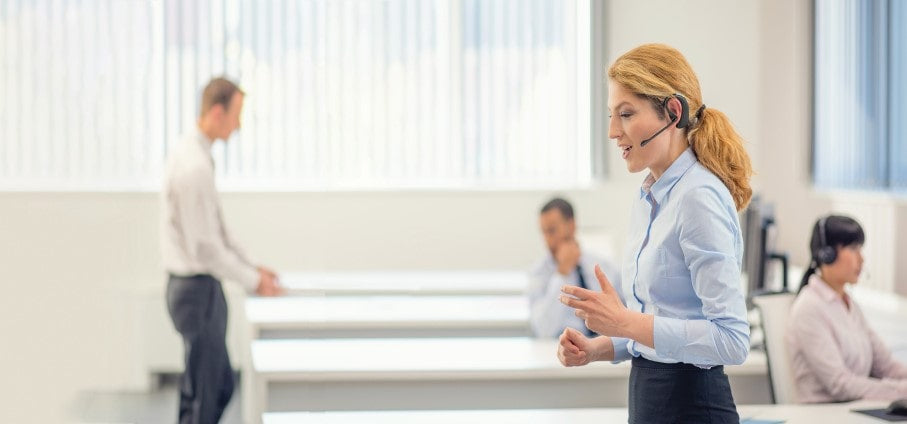Female Call Center Manager Using a Leitner OfficeAlly Single-Ear Wireless Headset