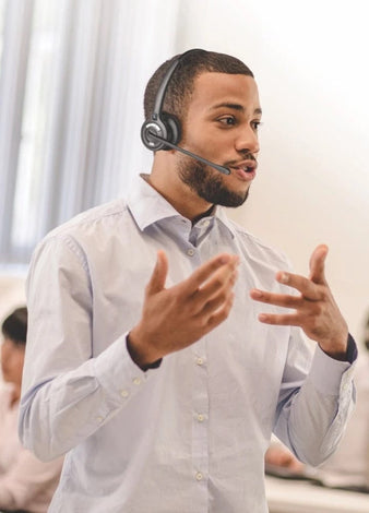 Call Center Agent using OfficeAlly wireless headset for phones